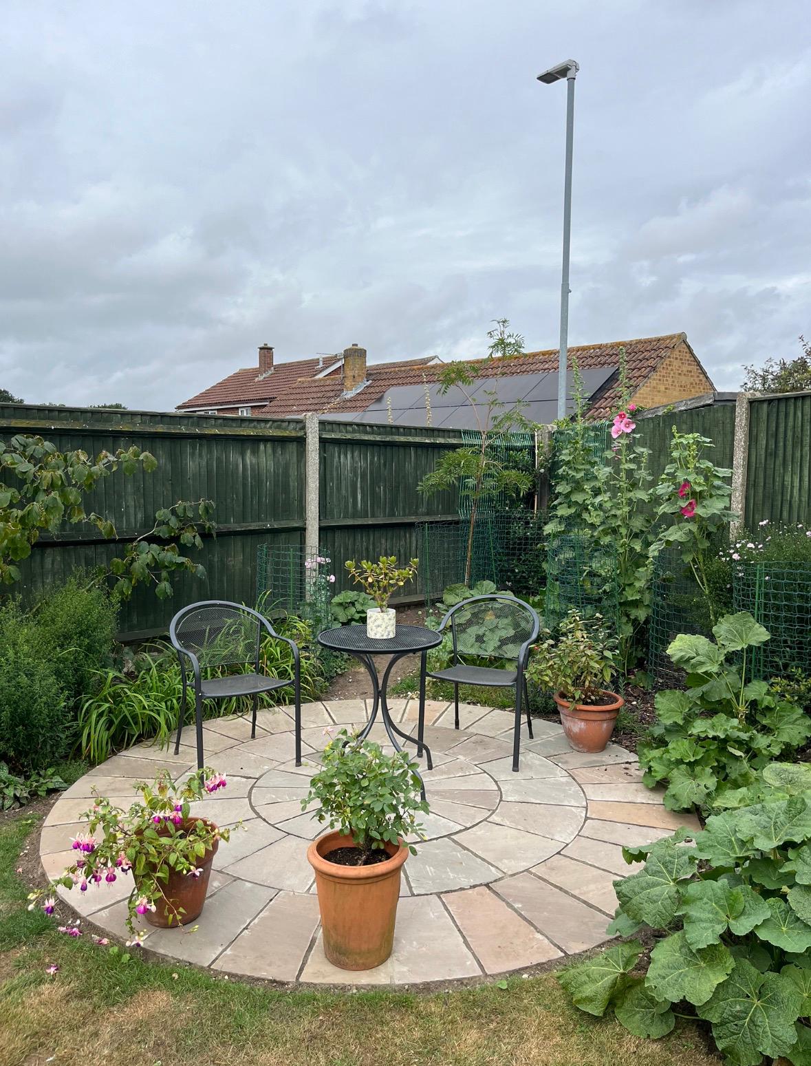 Circular patio with seating area